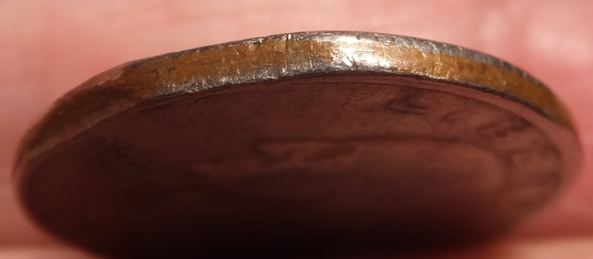 1977-Quarter,-Clipped-Planchet-Or-PMD?
