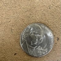 Strange-Coin-Found-In-A-Till