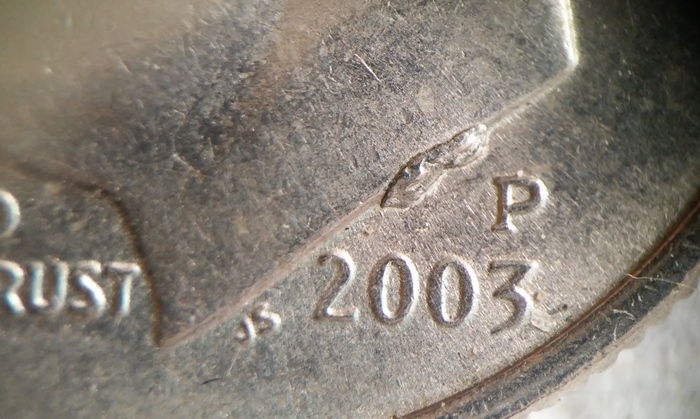 2003-P-Dime--With-Die-Chip-On-Neck-And-Ear
