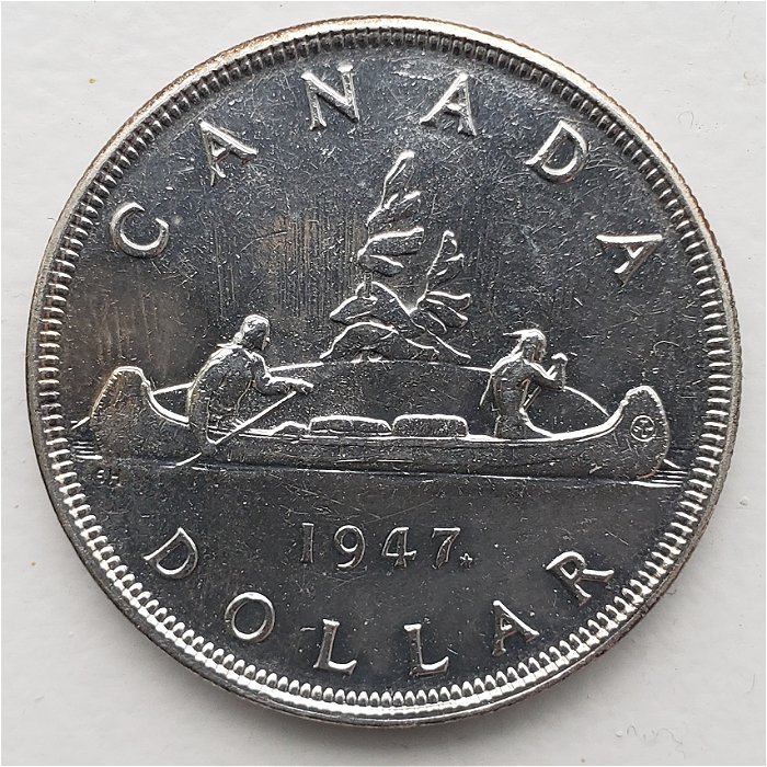 1947-Maple-Leaf-Dollar-For-Grade