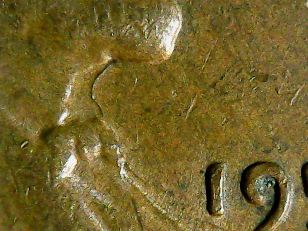 1957-D-LWC,-Die-Crack-From-Chin-To-Date.