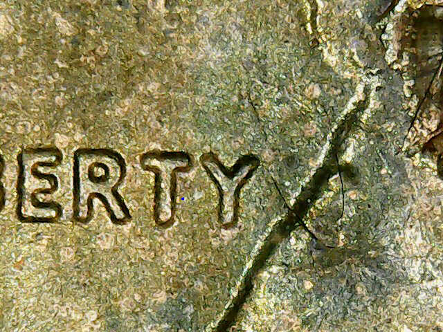 1975-D-LMC,-Multiple-Obverse-Delaminations.