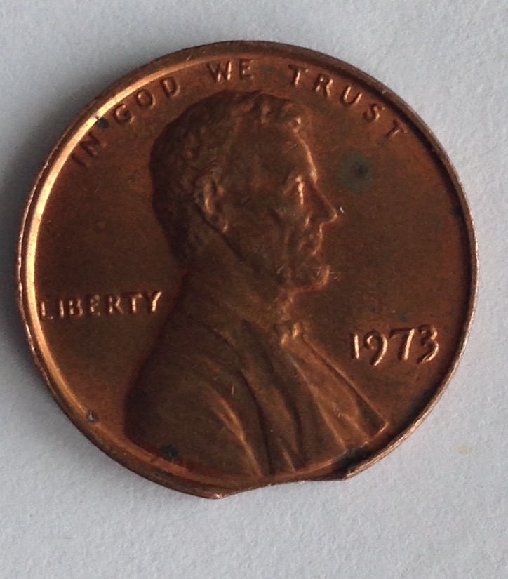 1973-Lincoln-Cent-Clipped-Planchet-Error-?