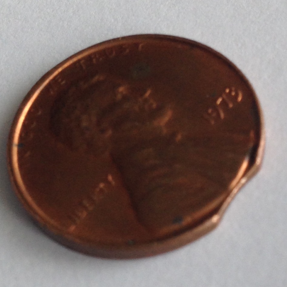 1973-Lincoln-Cent-Clipped-Planchet-Error-?