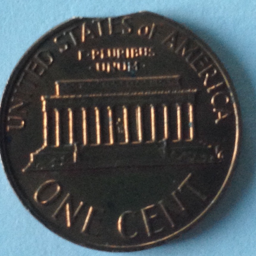 1973-Lincoln-Cent-Clipped-Planchet-Error-?