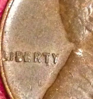 1957-D-Lincoln-Cent--A-Lot-Is-Going-On-With-This-Coin