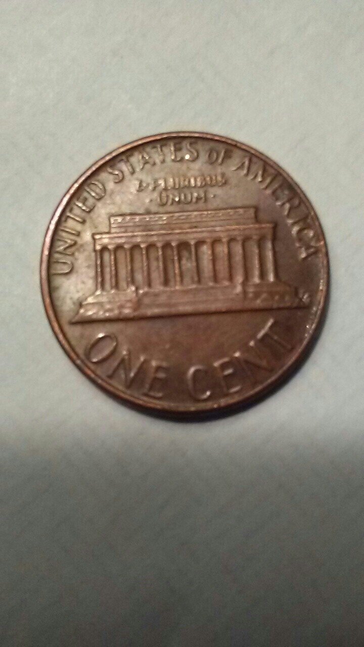 Any-Input-On-The-Li-On-This-Penny.-It-Looks-Like-A-U.