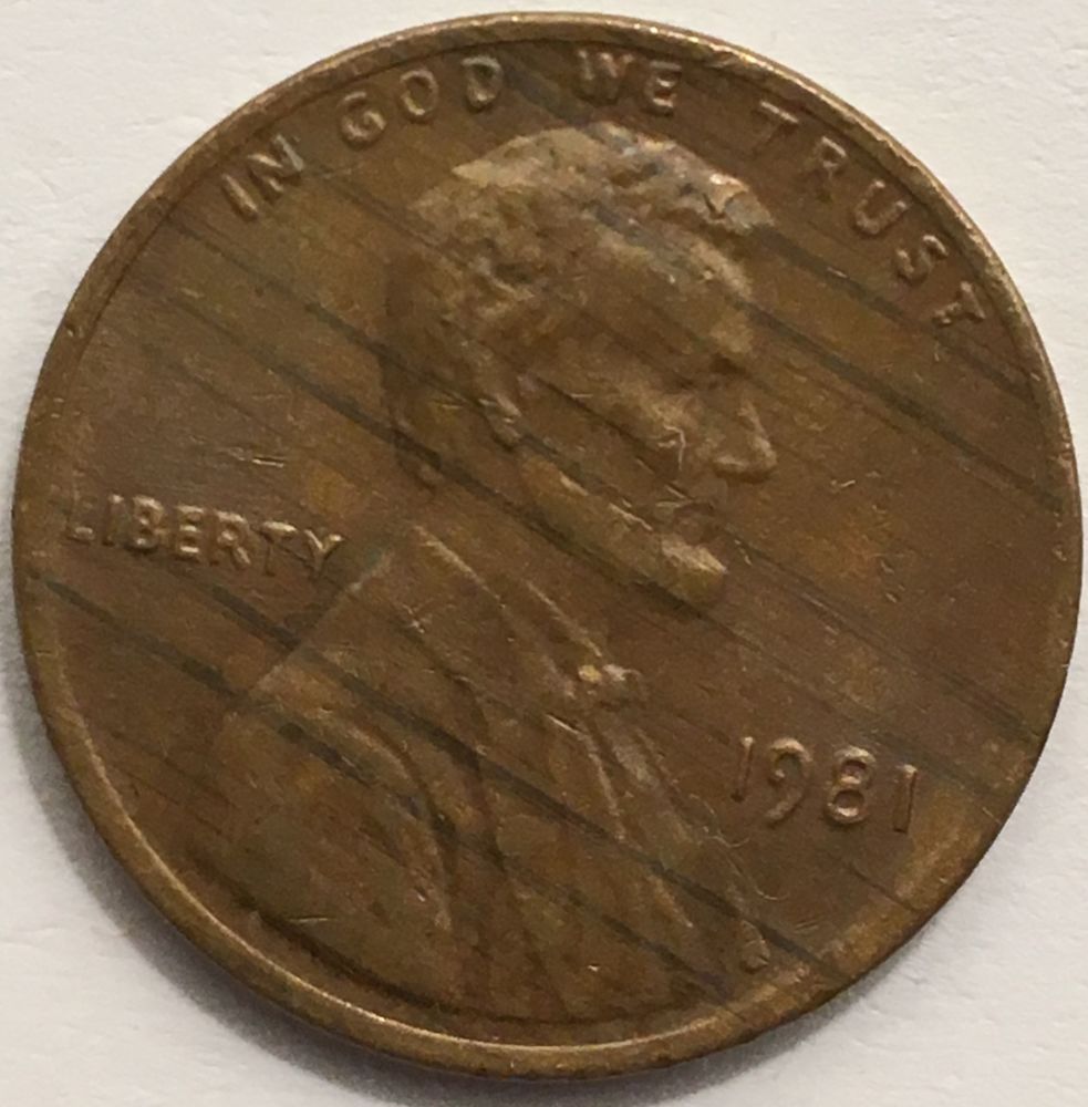 Woody-Lincoln?-Missing-Part-Of-Obverse-N-And-Reverse-A-..-Multiple-Rim-Cud?
