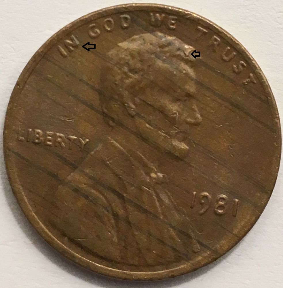 Woody-Lincoln?-Missing-Part-Of-Obverse-N-And-Reverse-A-..-Multiple-Rim-Cud?