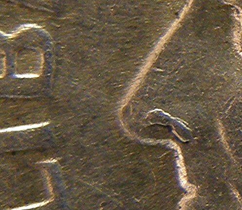 1957-D-Dime-Nostril-Die-Gouge---I-Think?