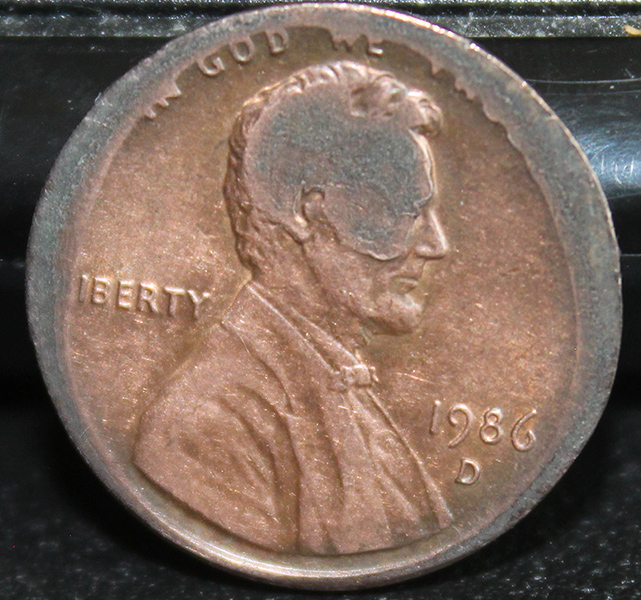 Two-80's-Lincoln-Cents.-Cut-Planchet?-Melted?