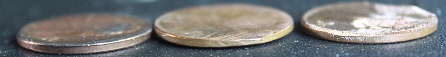 Two-80's-Lincoln-Cents.-Cut-Planchet?-Melted?