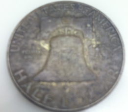 Should-I-Clean-My--1960-Franklin-Half-Dollar?