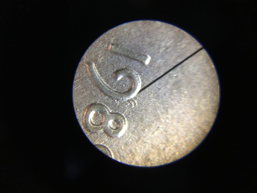 The-Nine-Has-Hair--Stamped-Through-Possibly-?