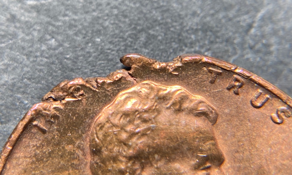 1959-LMC-Defective-Planchet-Ragged-Clip