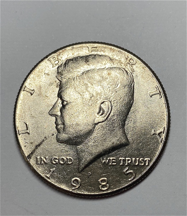 1985-P-Kennedy-Half-Struck-Through-Reeding