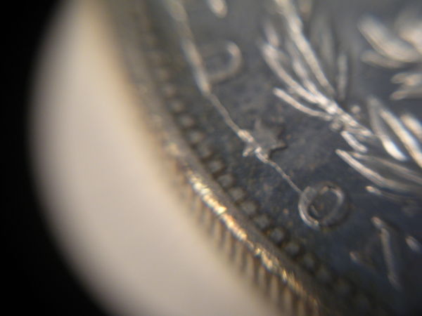 1899-O-Morgan-Dollar,-Die-Cracks.