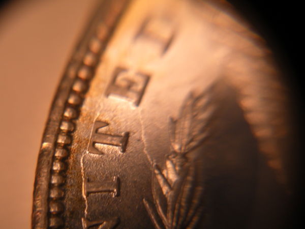 1899-O-Morgan-Dollar,-Die-Cracks.