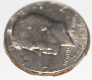 1976-Kennedy-Half-Dollar-Rim-And-Laminating-Errors?
