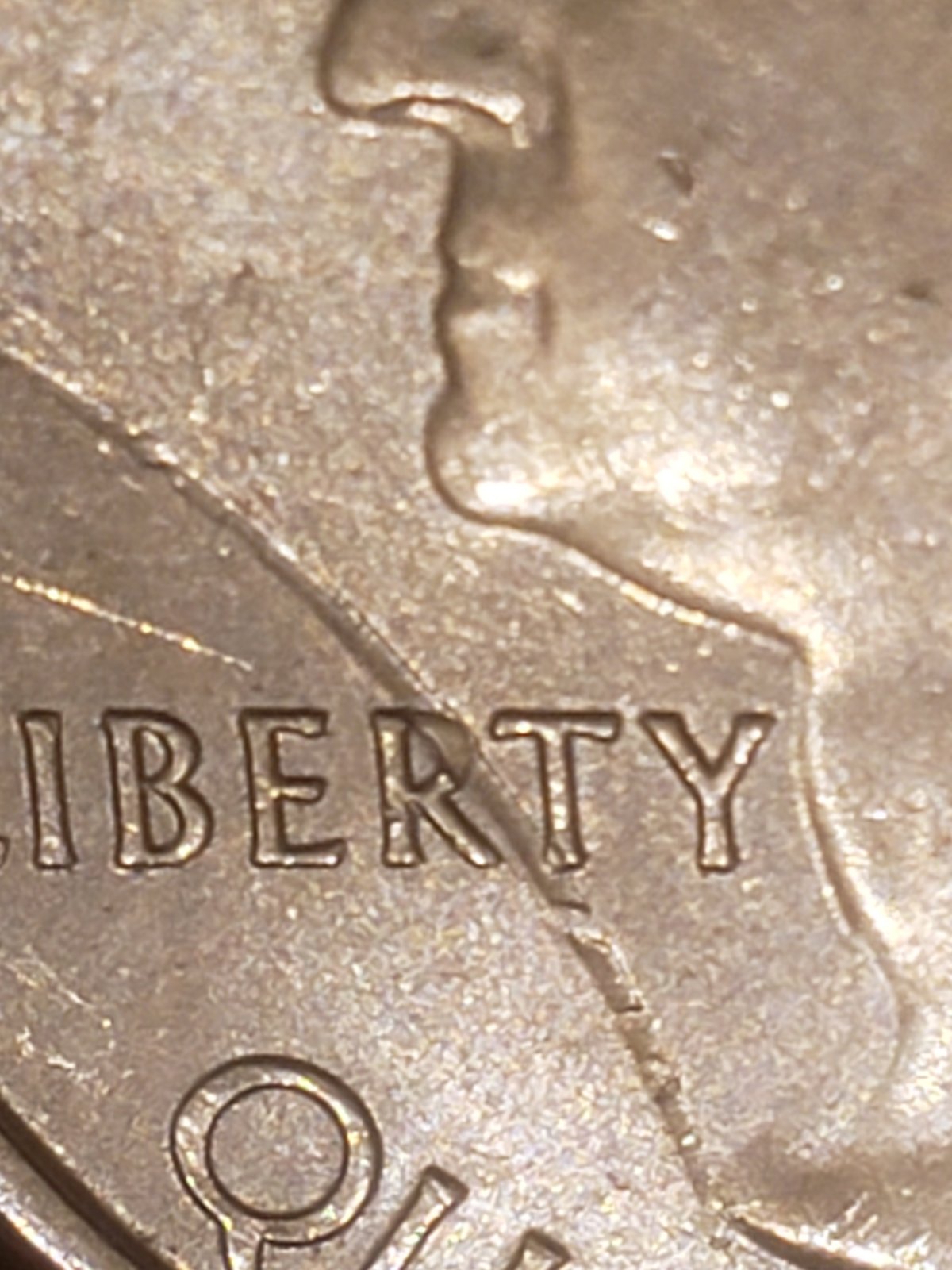 2018-Quarter-Struck-Through-Large-Rim-Burr