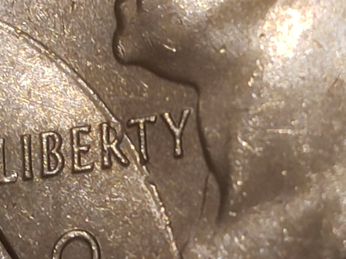2018-Quarter-Struck-Through-Large-Rim-Burr
