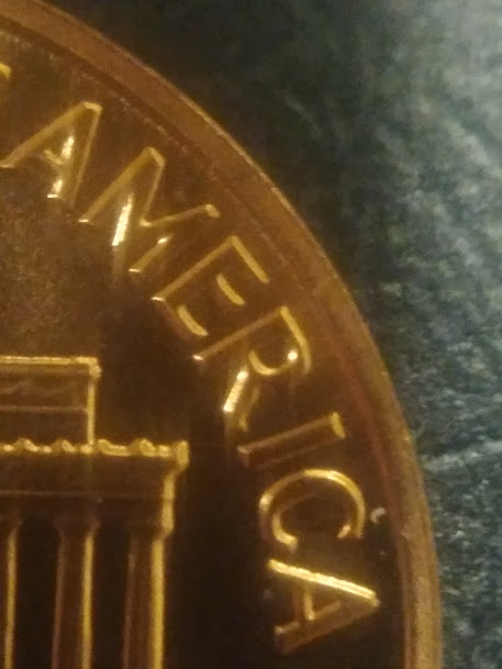 What-Grade-Would-You-Give-This-1964-Lincoln-Proof-?-And-Is-That-A-Die-Chip?