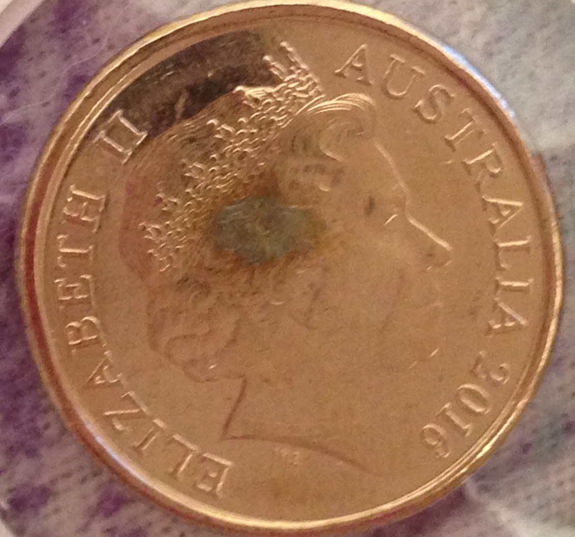 Why-Is-This-$1-Coin-Darker-Than-Others?