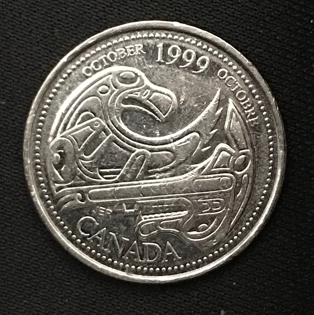 Help-With-Possible-Error:-Canadian-1999-Quarter