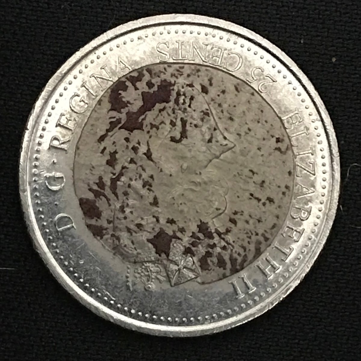 Help-With-Possible-Error:-Canadian-1999-Quarter