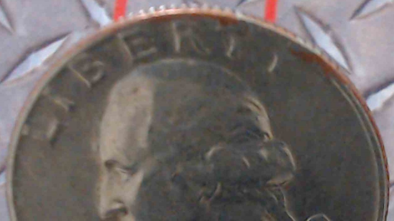 1965-P-Quarter-Rim-Cud-Die-Error?