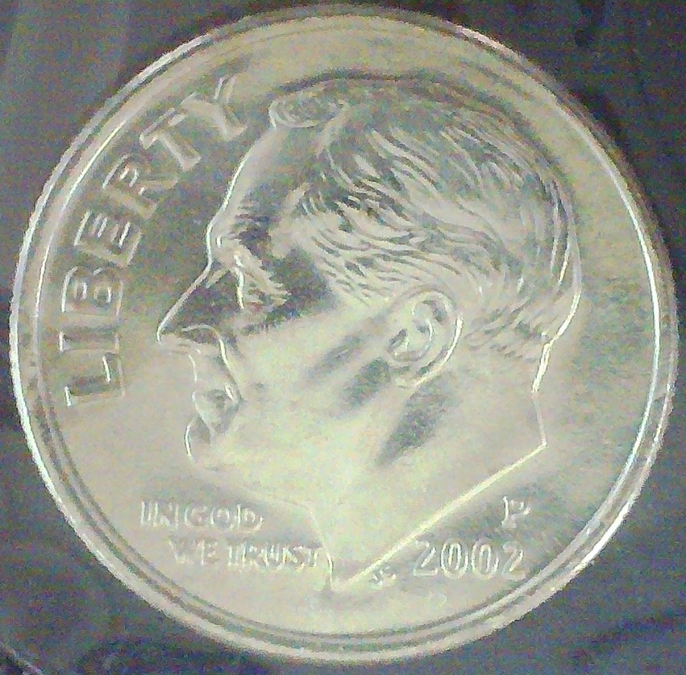 2002-Dime-Has-Clad-Missing-On-Rim-Does-It-Add-Value?
