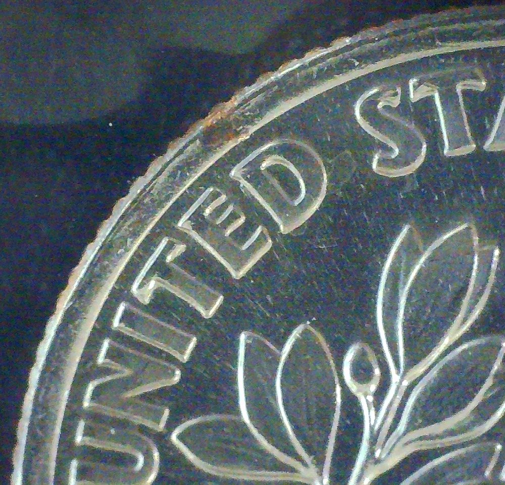 2002-Dime-Has-Clad-Missing-On-Rim-Does-It-Add-Value?