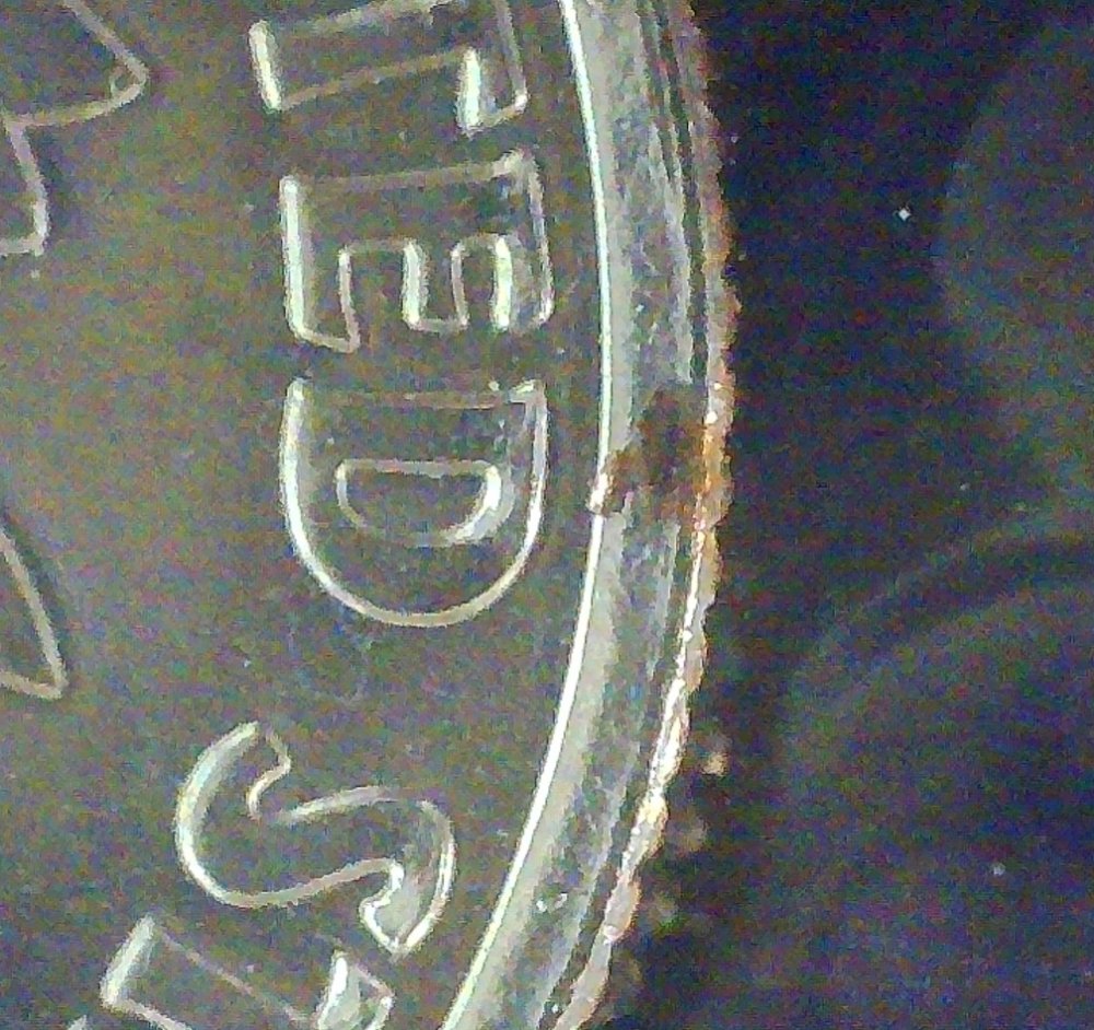2002-Dime-Has-Clad-Missing-On-Rim-Does-It-Add-Value?