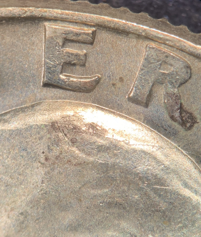 1964-D-Washington-Quarter.-Cracked-Scull.