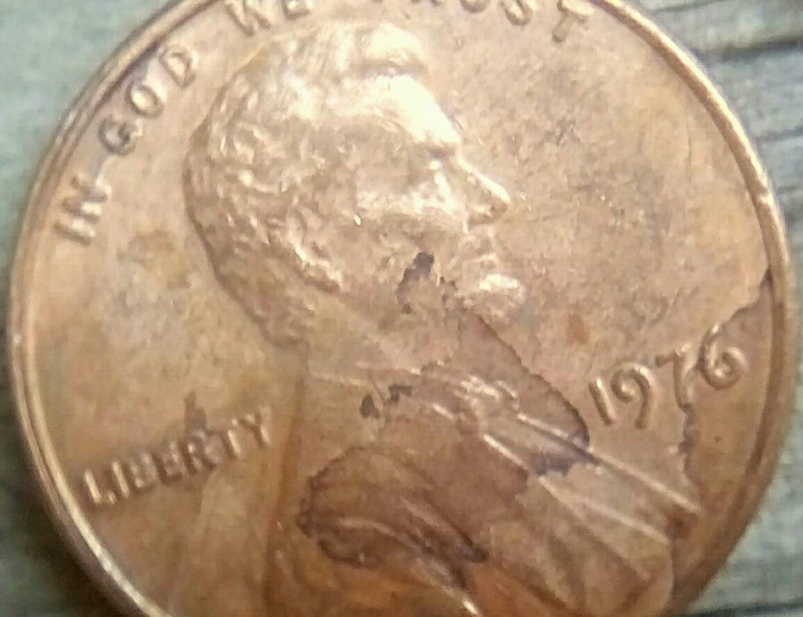 1976-LMC-Is-This-A-Lamination-Error-Or-Damage?