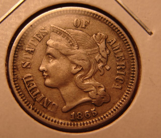1865-Three-Cent-Piece-Retained-Cud?