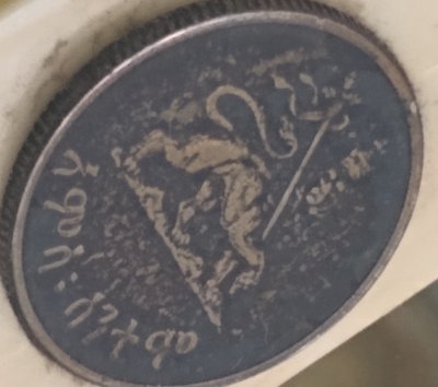 Interesting-Looking-Coin-Embedded-On-Bone-Knife-Blade.