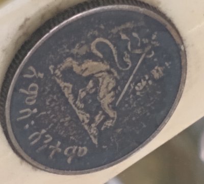 Interesting-Looking-Coin-Embedded-On-Bone-Knife-Blade.