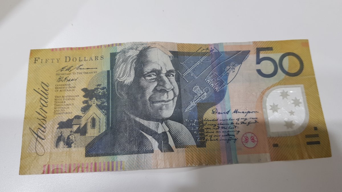 1995-What-Was-The-Mint-Doing-That-Made-The-50-Dollar-Being-Cut-Off-Centered