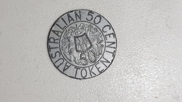 Huh-Some-Plastic-Token,-Guess-I-Take-It.