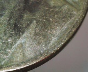 1945-P-War-Nickel-With-Mystery-Mark.