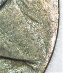 1943-P-War-Nickel-With-Unidentified-Indentation