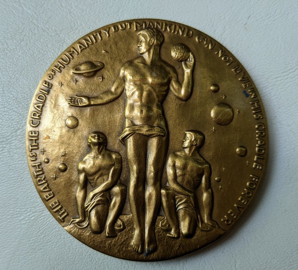 Post-A-Coin-Or-Medal-Related-To-Space-Travel.