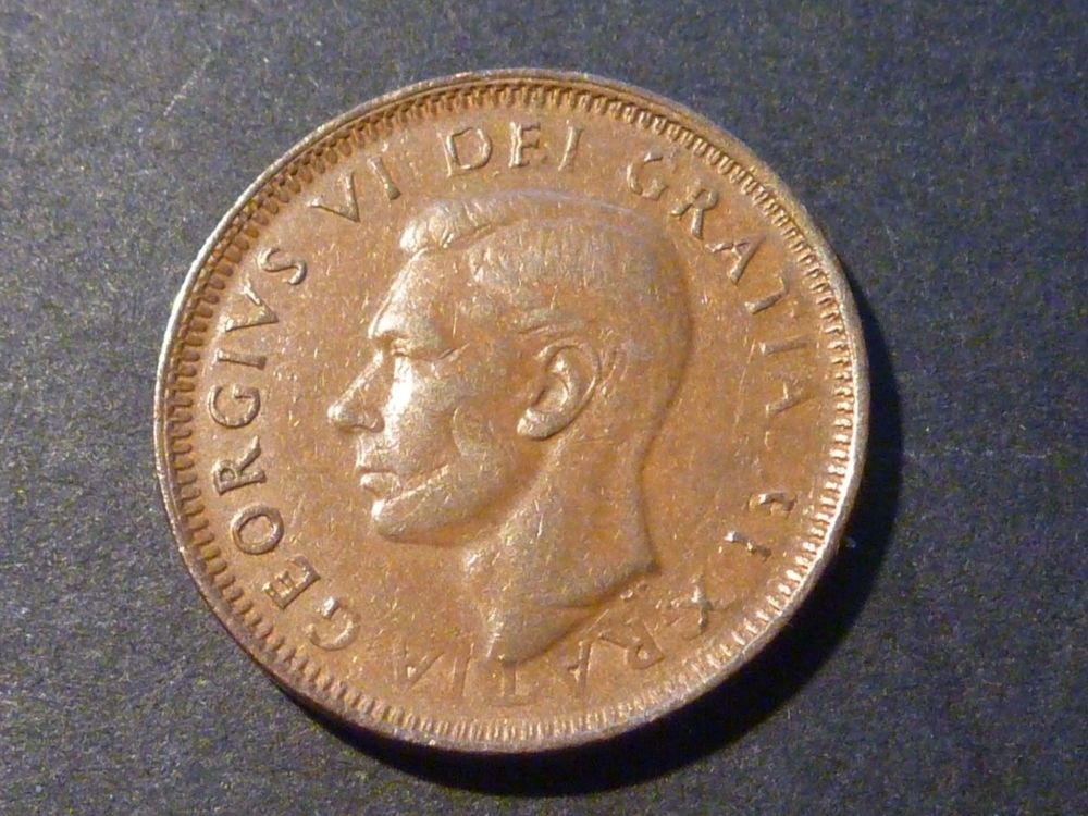 An-Interesting-Pair-Of-Double-Struck-1949-1-Cent-Coins