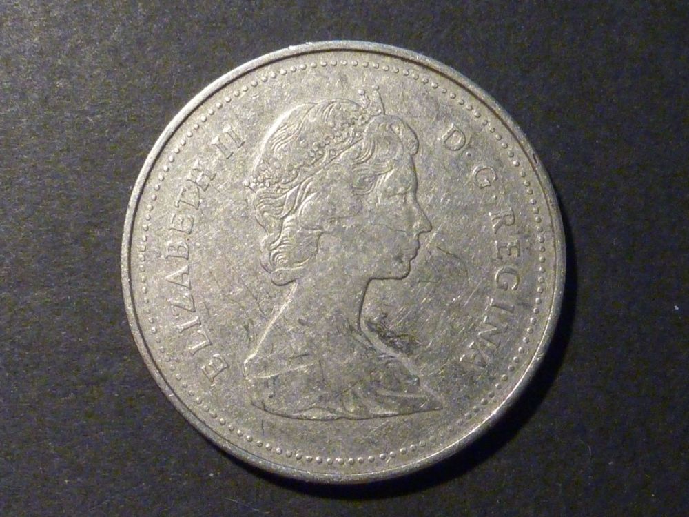 Grade-My-Pocket-Piece---1986-Nickel-Dollar