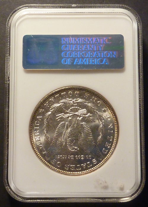 1887-Morgan-Dollar---Die-Cracks-Galore...-In-NGC-Sample-Slab