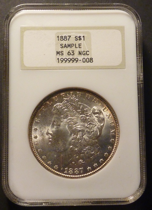 1887-Morgan-Dollar---Die-Cracks-Galore...-In-NGC-Sample-Slab
