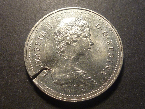1981-Nickel-Dollar-Cracked-Planchet