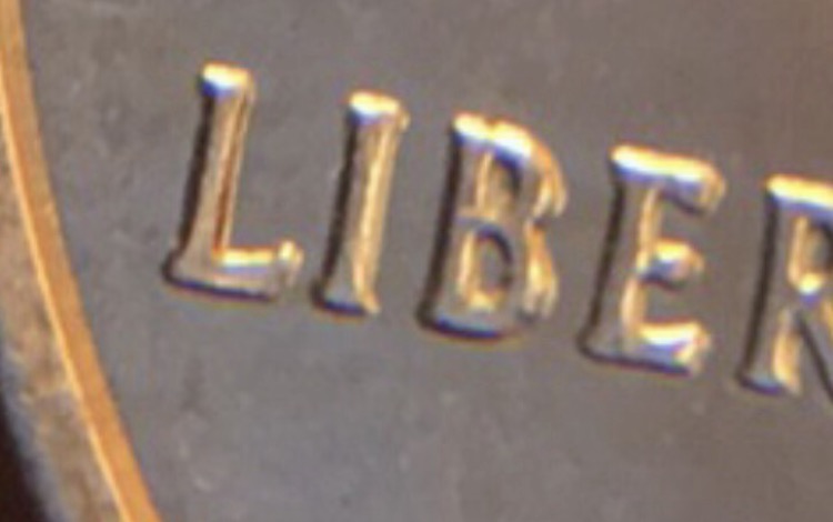 2002-Quarter-Doubled-Die?--Also-Something-In-Between-The-