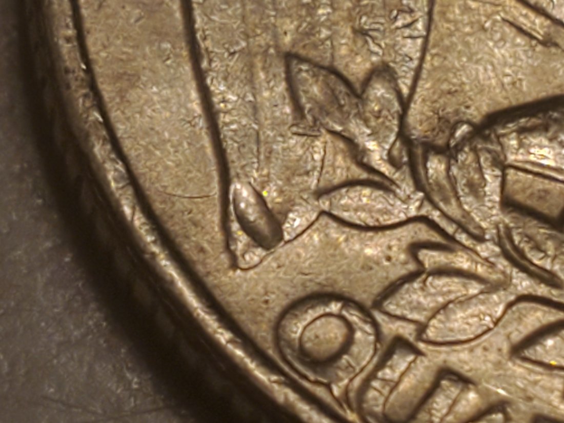1985-P-Washington-Quarter-Struck-Through-Debris-Reverse